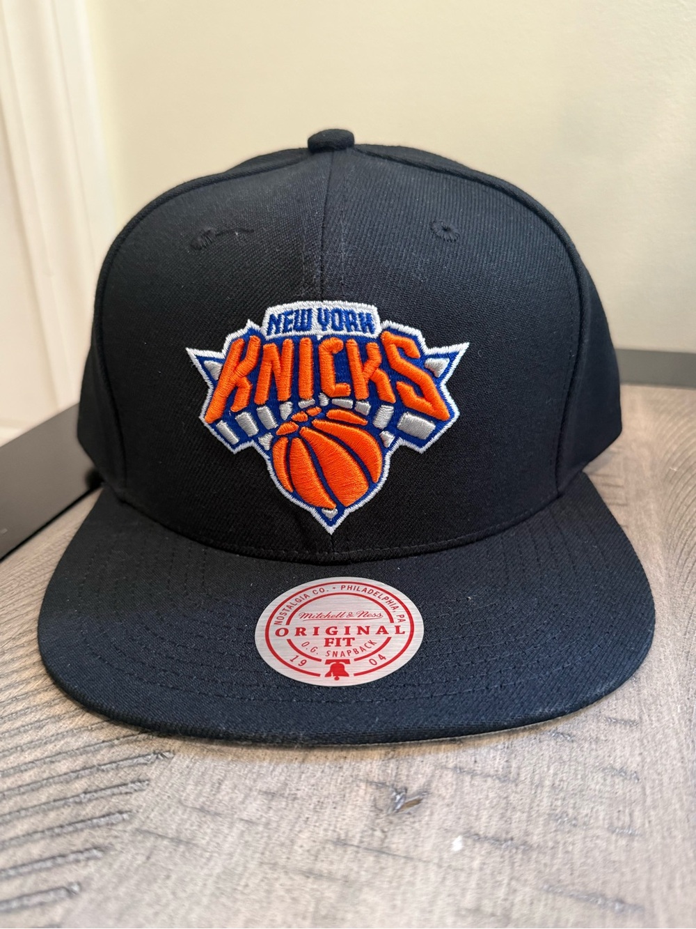 NBA Black Snapback Hat with Orange and White Knicks Logo
